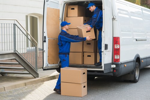 Removal team loading furniture for a Plumstead home relocation